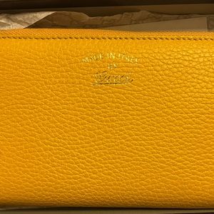 Brand New Gucci Yellow classic leather wallet